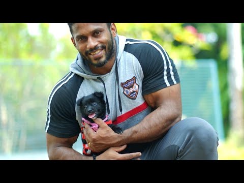 Chitharesh Natesan playing with his cute puppy